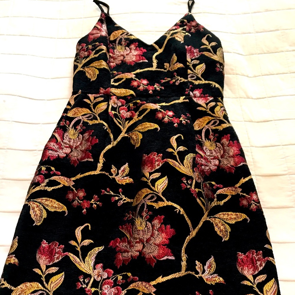 Spaghetti strap embroidered cocktail dress.